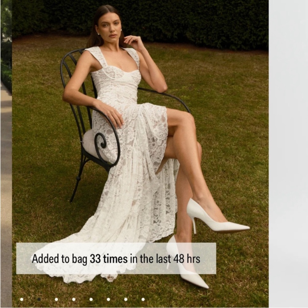 Meshki White Sleeveless Bridal Gown with Slit
NEW WITH TAGS
